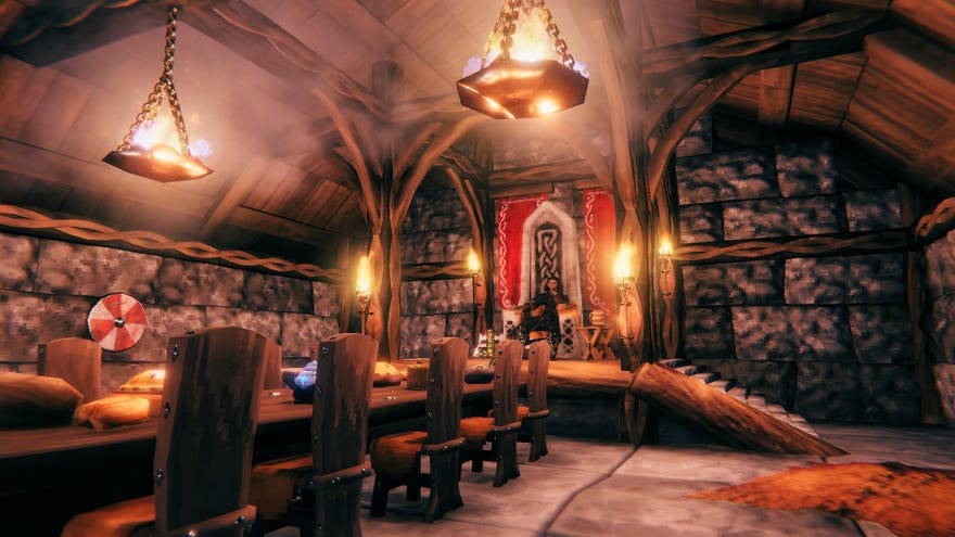 In interior of a Viking longhouse in Valheim's new Hearth & Home update.