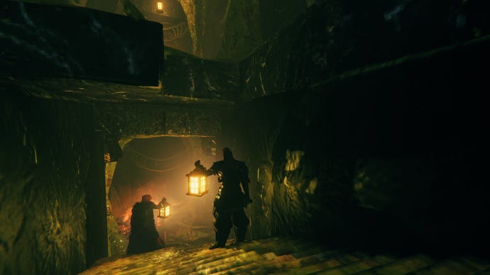 Two players hold lanterns to stave off the darkness of a Valheim Mistlands dungeon.