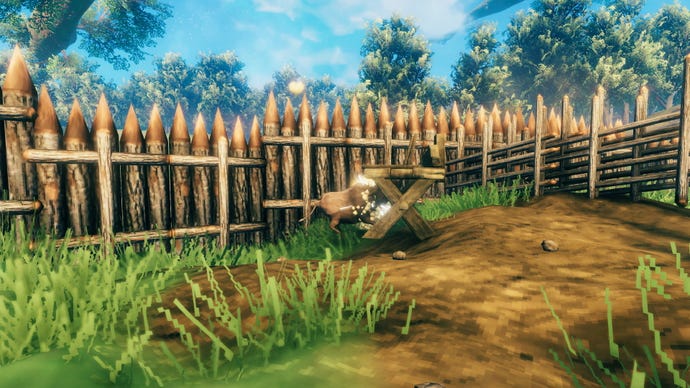 A screenshot from Valheim which shows a boar slamming into a workbench.