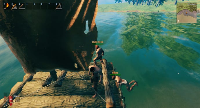 A Valheim screenshot which shows Sigmund swimming into the back of our raft in the hopes of propelling it forwards.