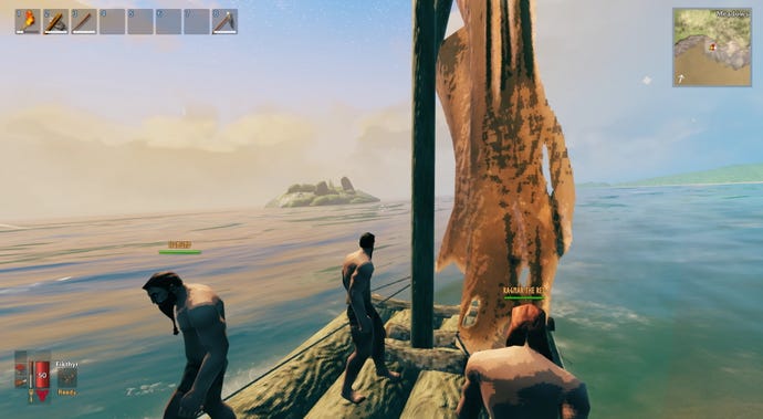 A Valheim screenshot which shows the three of us, still on the raft, approaching a rocky isle in the distance.
