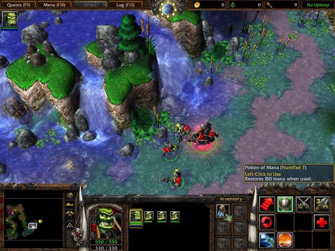 Orcs travel across a waterfall scene in Warcraft III