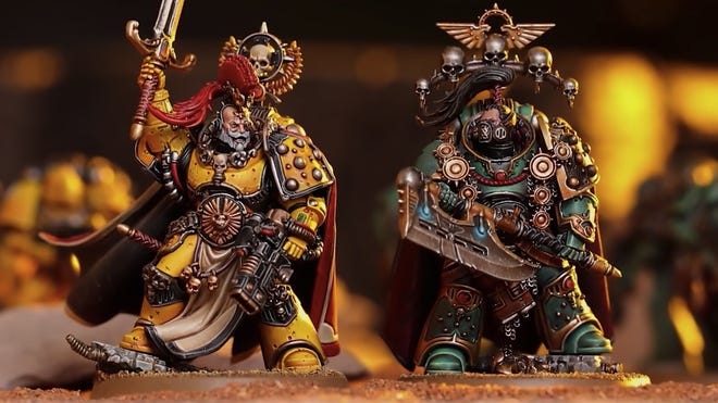 A close-up of Space Marine miniatures from the Warhammer: The Horus Heresy - Age of Darkness boxed set