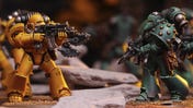 A close-up of Space Marine miniatures from the Warhammer: The Horus Heresy - Age of Darkness boxed set