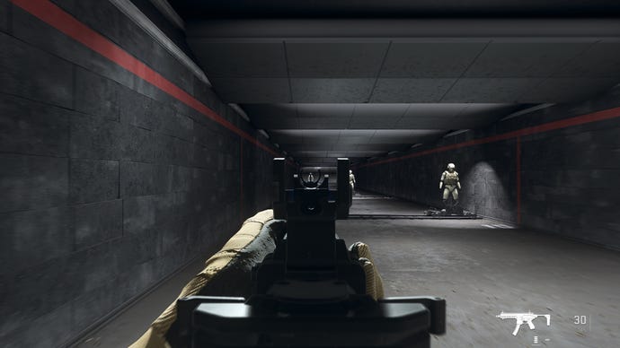 The player in Warzone 2.0 aims at a training dummy with the Chimera ironsights.