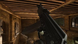 The player in Warzone 2.0 inspects their weapon, the Kastov 545.