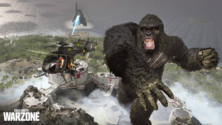 Call of Duty Warzone screen showing King Kong swatting at a helicopter while Godzilla breathes fire in the background