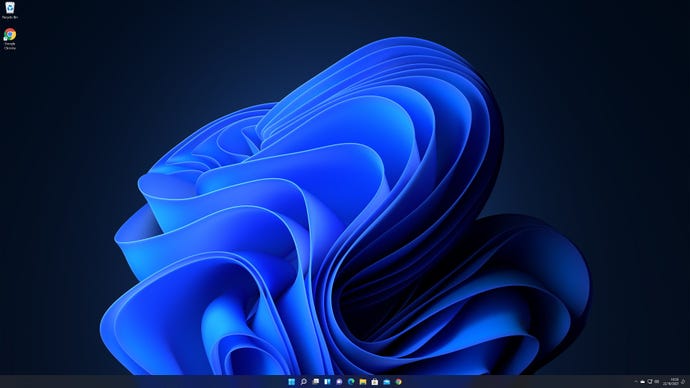 The Windows 11 desktop in dark mode.