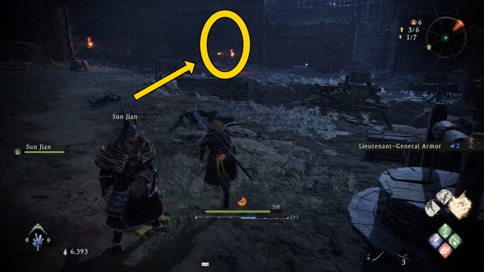 The player in Wo Long runs past a village well at nighttime, towards a marked room entrance.