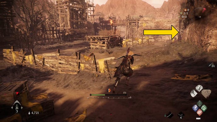 The player in Wo Long heads through a wartorn village.