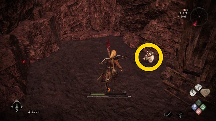 The player in Wo Long finds a Shitieshou demon hiding around a corner.