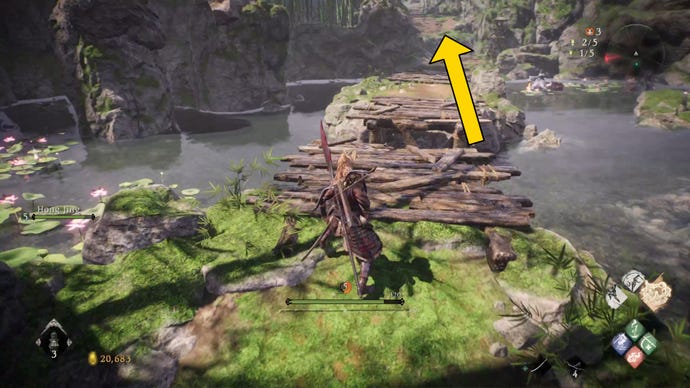 The player in Wo Long stands at the foot of a broken bridge across a pond guarded by mermaid enemies.