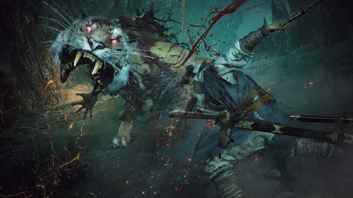 The player strikes a huge demonic tiger in Wo Long: Fallen Dynasty.