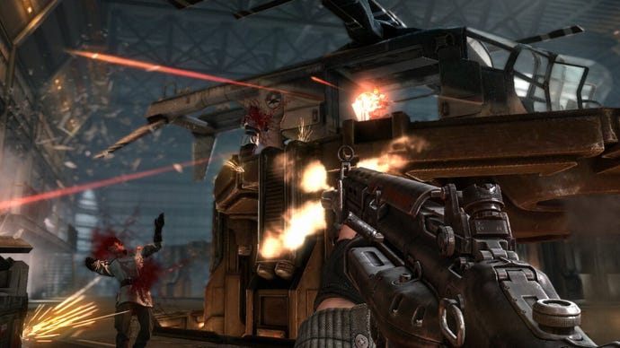 An image from Wolfenstein: The New Order which shows the player shoot an enemy inside a warehouse.