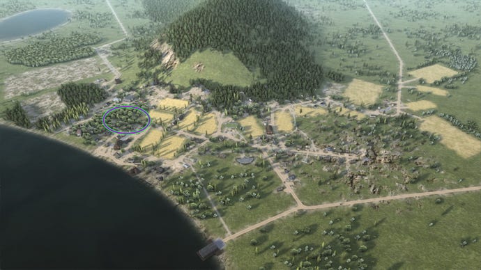 An aerial view of a rural town in Workers & Resources: Soviet Republic