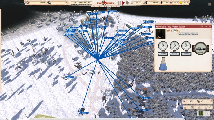 A bird's eye view of a city in Workers & Resources that shows how far different buildings are from a water tower