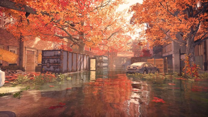 An autumnal map in XDefiant, with red trees surrounding a river path.