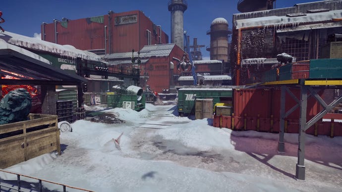 A snow-filled map in XDefiant, set in an industrial complex.