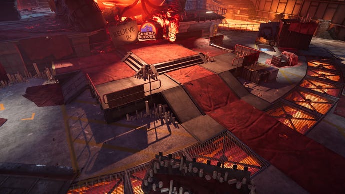 An indoor area of an XDefiant map with red carpets leading up to a podium.
