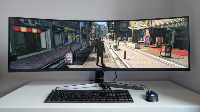 A photo of an ultrawide gaming monitor running Yakuza 0