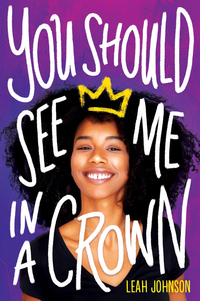 Purple cover of You Should See Me in a Crown featuring a girl smiling with a crown drawn on her head