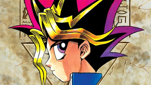 Cropped cover of Yu-Gi-Oh volume one, featuring Yu-Gi-Oh, with spiky hair, looking at reader