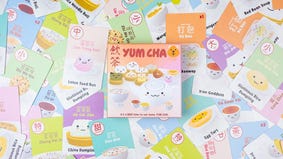 A image of cards and a box for the Yum Cha board game