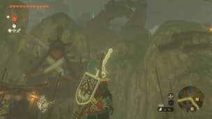 Link standing next to the Ring Ruins in Kakariko Village in Zelda: Tears of the Kingdom