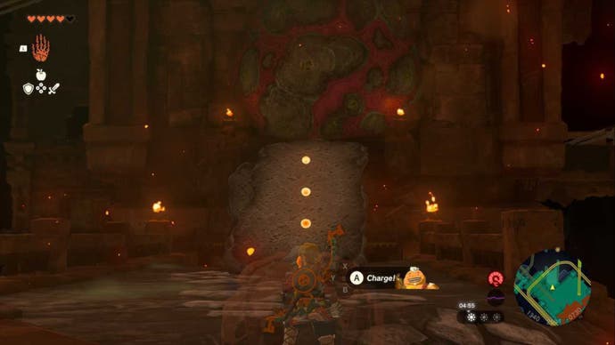 Zelda Totk, Link startet Yunobo in Richtung eines Felsbrockens, der eine Tür im Feuertempel blockiert