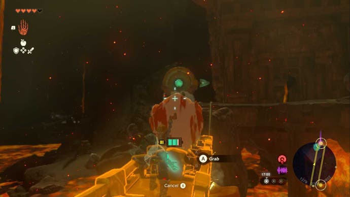 Zelda TOTK, Link is on a cart in the fire temple with Yunobo aiming at a target.
