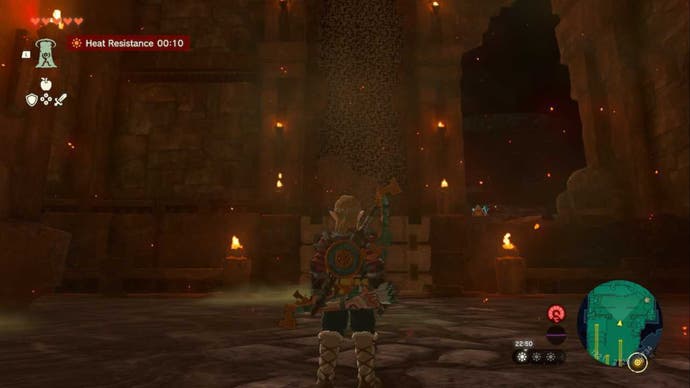 Zelda TOTK, Link is looking at a broken bridge in the Fire Temple.