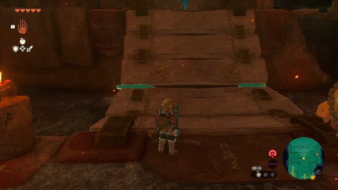 Zelda TOTK, Link is looking at a bridge in the Fire Temple that has been stuck together with Ultrahand.