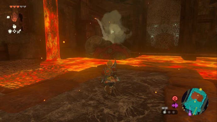 Zelda TOTK, Link is looking at water flowing into lava in the Fire Temple after clearing a boulder.