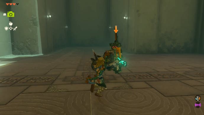Zelda Tears of the Kingdom, Link fighting a Zonai  Soldier Construct in the first room of Sanctuary.