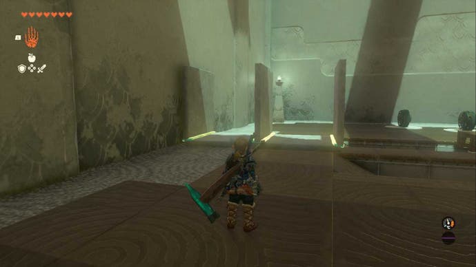 Zelda Totk Jiukoum Shrine, Link starrt auf eine Reihe von Platten, die an einer längeren Platte angebracht sind