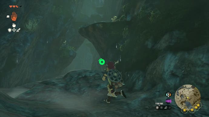 Link approaching some large rocks he can climb in the Ploymous Mountain Cave.