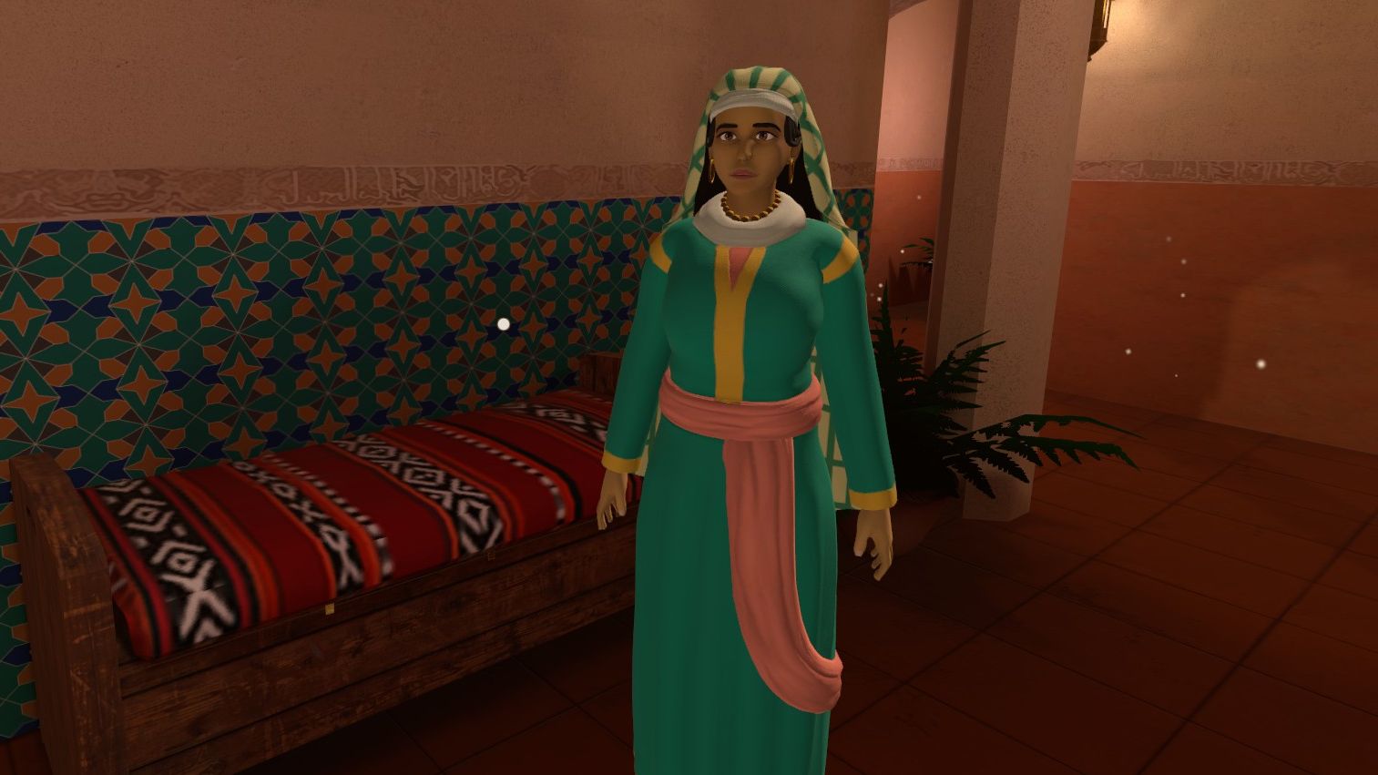 An Arab woman standing next to a beautifully tiled wall in Zellige