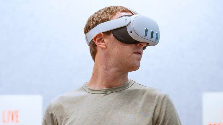 Mark Zuckerberg wearing a Meta Quest 3 headset, looking off to the right of the frame